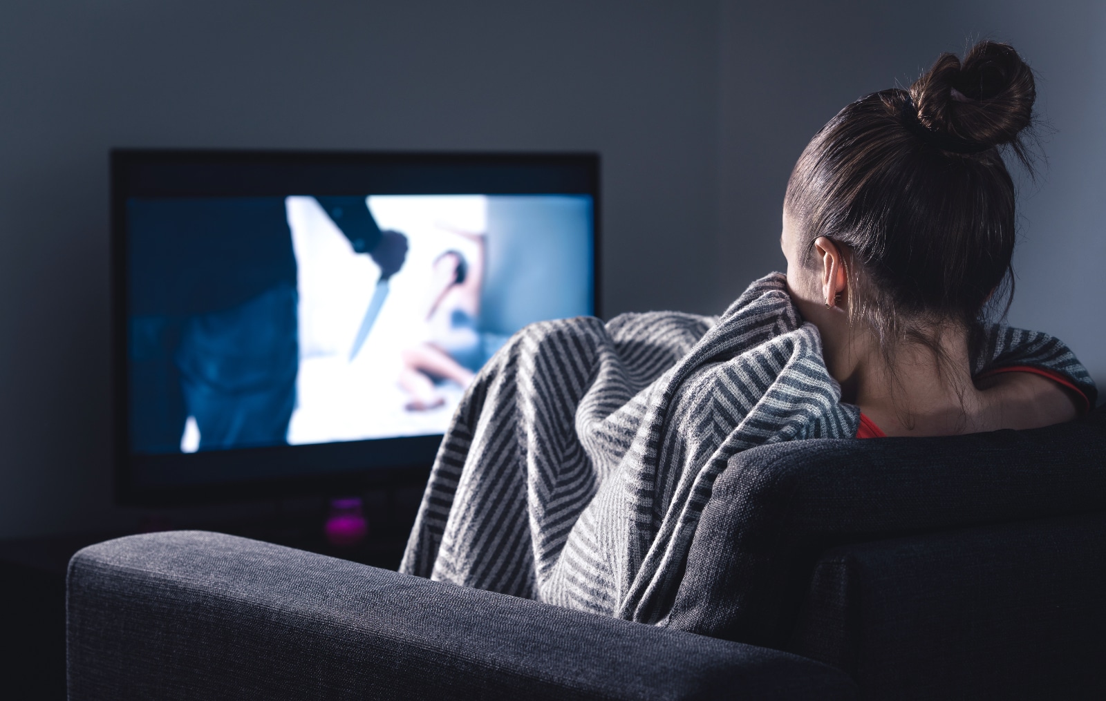 Woman watching indie horror movie</p>
<p>