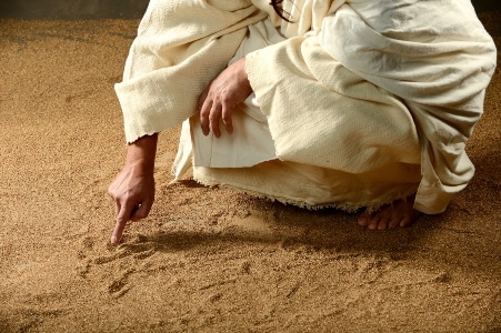 Jesus Writing on the sand with his finger Jesus Christ writing in the Utah sand in The Chosen film