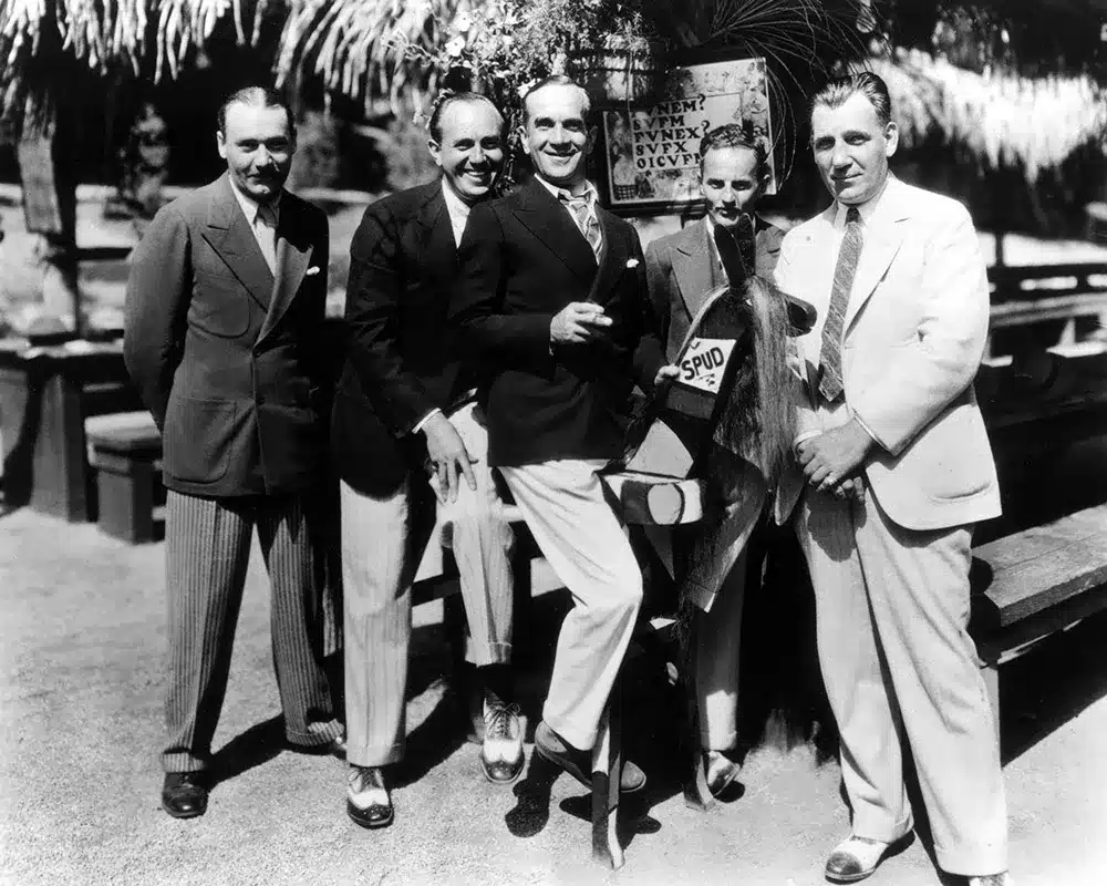Harry Warner, Jack Warner, Al Jolson, Darryl F. Zanuck, and Al Warner on the Warners lot in 1927.