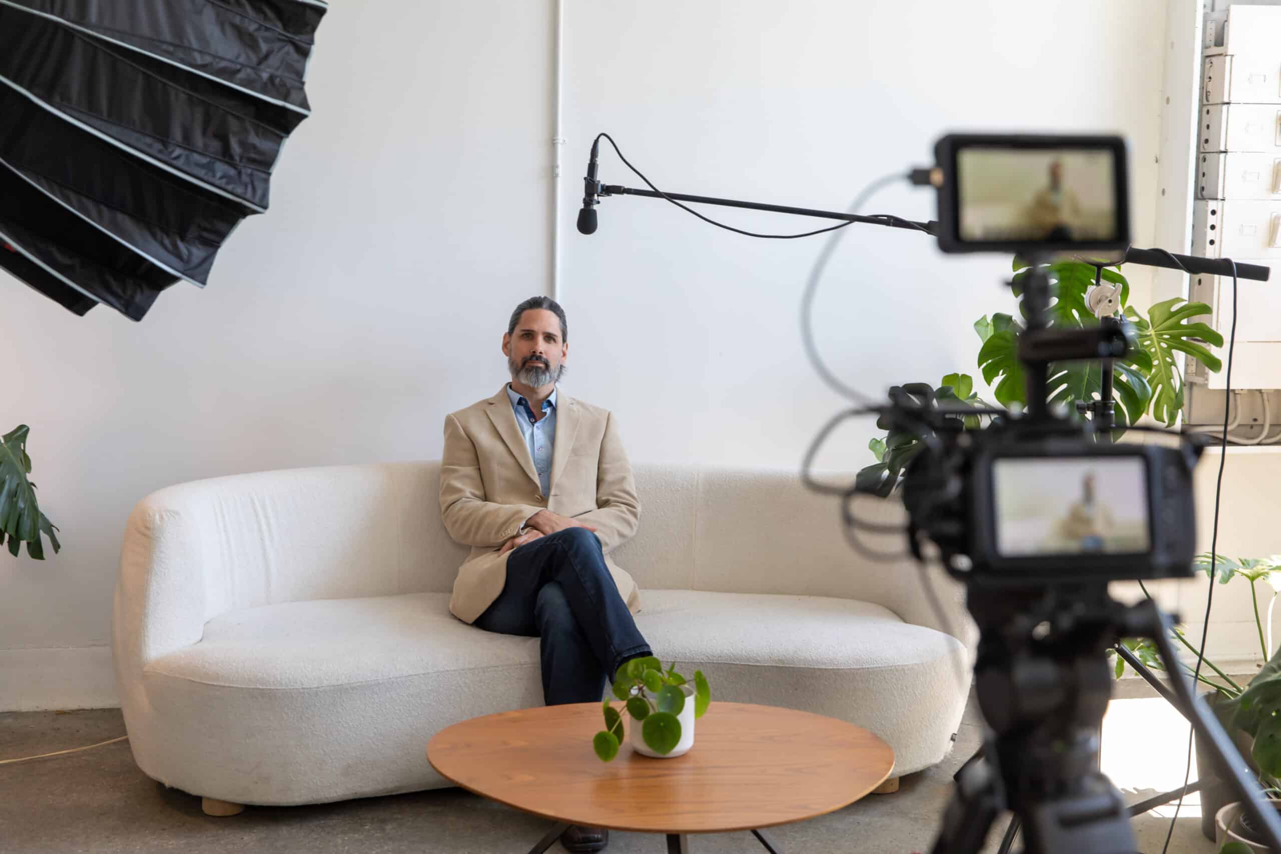 Man being interviewed for a customer testimonial video
